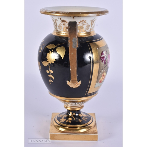 85 - AN EARLY 19TH CENTURY ENGLISH PORCELAIN TWIN HANDLED VASE unusually painted with a still life on a g... 