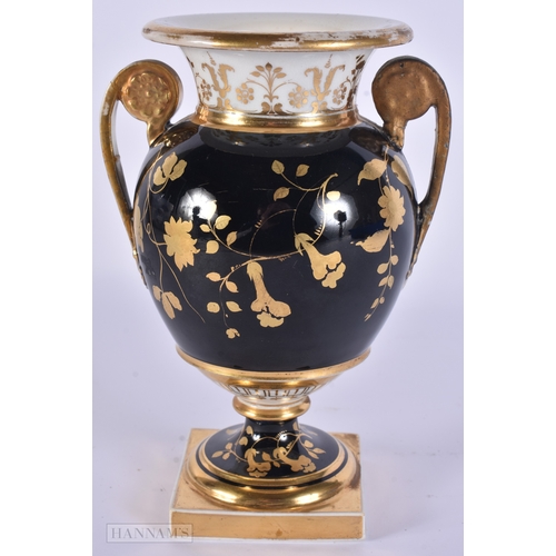 85 - AN EARLY 19TH CENTURY ENGLISH PORCELAIN TWIN HANDLED VASE unusually painted with a still life on a g... 