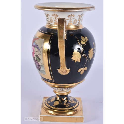85 - AN EARLY 19TH CENTURY ENGLISH PORCELAIN TWIN HANDLED VASE unusually painted with a still life on a g... 