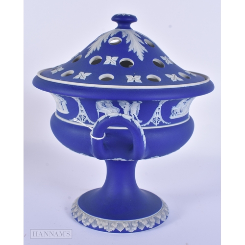 87 - A LARGE ANTIQUE WEDGWOOD BLUE JASPERWARE TWIN HANDLED POSY VASE AND COVER together with a large Germ... 