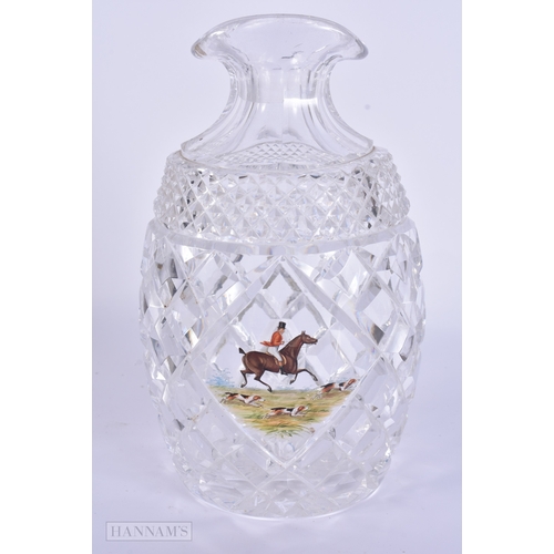 97 - AN ANTIQUE ENAMELLED FOX HUNTING CUT GLASS DECANTER. 21 cm x 12 cm.