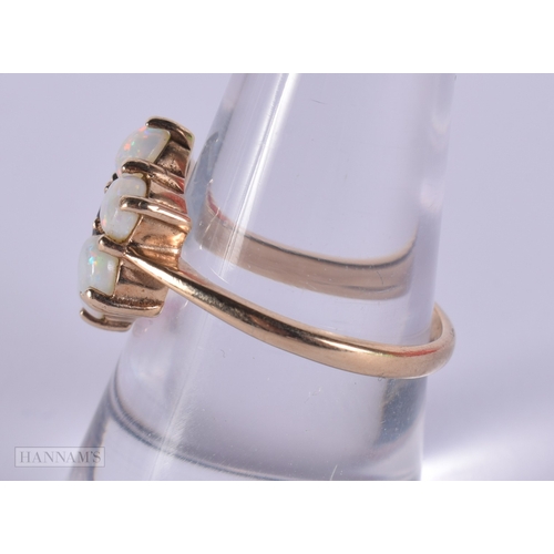 1127 - 9ct gold opal and garnet cluster ring.  Size P (3.5g)