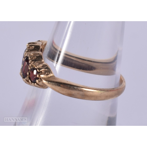 1134 - 9ct gold vintage garnet set five stone ring.  Size N (2.4g)