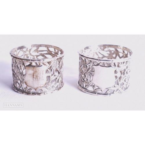 1165 - Pair of .900 Silver Wang Hing Chinese Export Napkin Rings 52g. 4.25 cm wide.