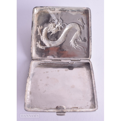 1168 - .800 silver Chinese dragon detailed cigarette case 103g. 7.75 cm x 8.5 cm.
