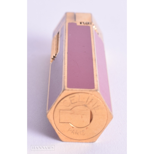 1185 - Celine PARIS Rare Hexagon Red Enamelled Pocket Lighter w/ Gold Trim Boxed. 6.75 cm x 1.5 cm.