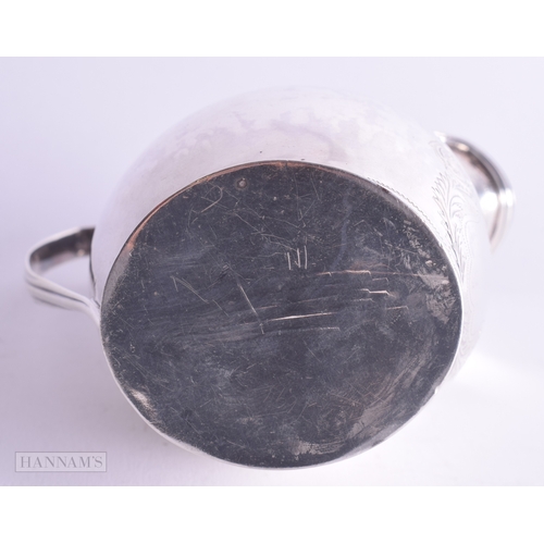 1202 - .925 sterling silver Georgian cream jug 104g. London 1818. 104 grams. 10.75 cm high.