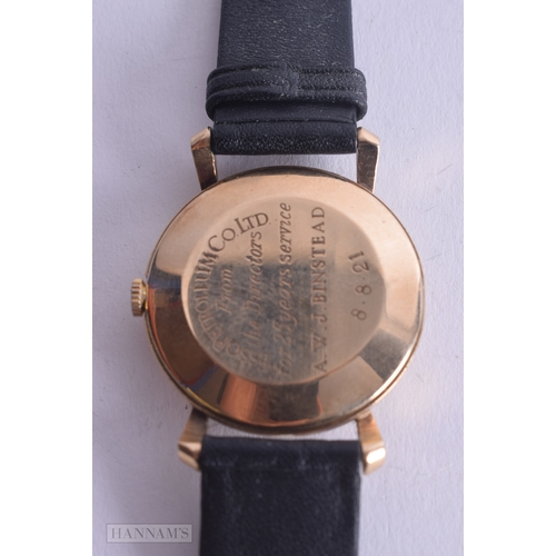 1245 - Garrard 9ct Gold Presentation Watch Hand-Wind Working. 3.5 cm wide.