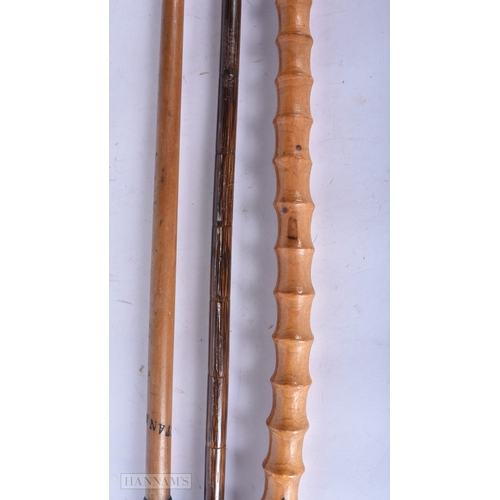 3000 - A bamboo walking cane with a silver collar together with a Japanese cane and another horn handled ca... 