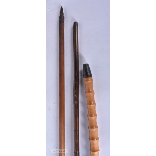 3000 - A bamboo walking cane with a silver collar together with a Japanese cane and another horn handled ca... 