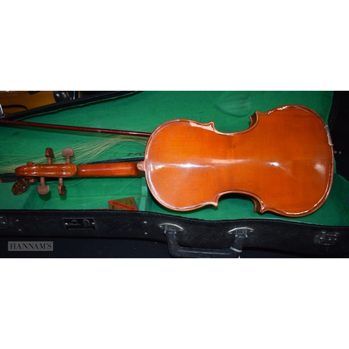 3002 - A cased  Stentor violin together with another cased Lark Violin (2)
