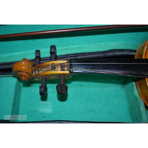 3002 - A cased  Stentor violin together with another cased Lark Violin (2)