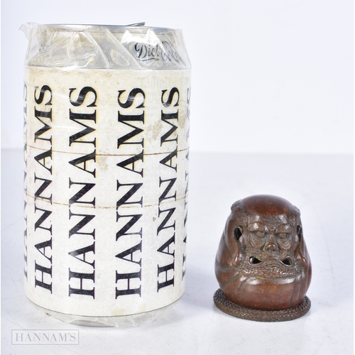 3007 - A Japanese bronze warriors head 5 cm.