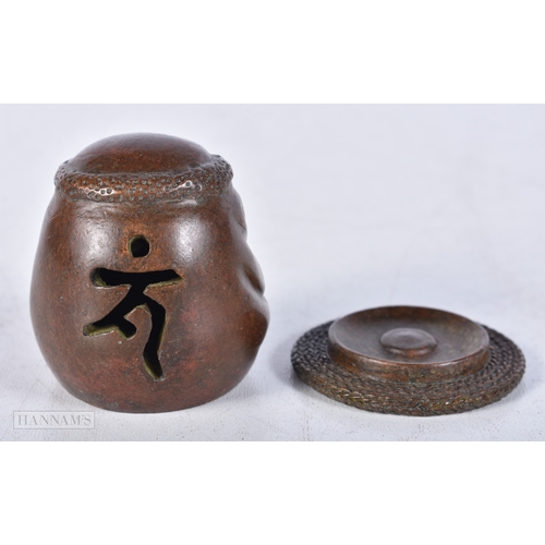 3007 - A Japanese bronze warriors head 5 cm.