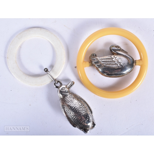 3008 - Two antique silver plate babies rattles in the form of a Penguin and a duck 13cm (2).