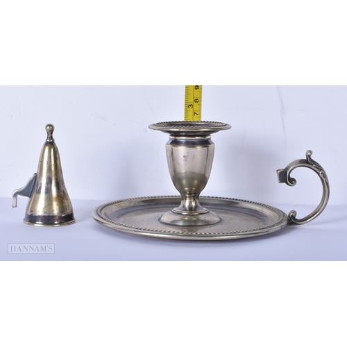 3023 - An antique silver plate chamberstick 7 x 15cm.