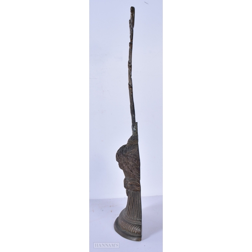 3038 - An antique brass wheatsheaf door stop 41cm.