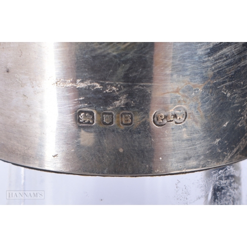 3042 - A pair of silver rimmed cut glass decanters 28cm (2)