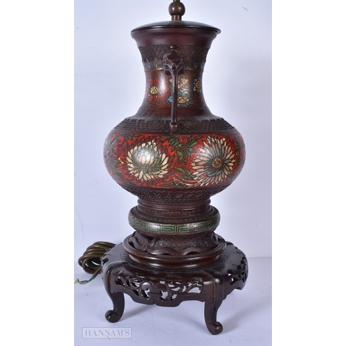 3055 - A Chinese Cloisonne bronzed lamp base 51cm