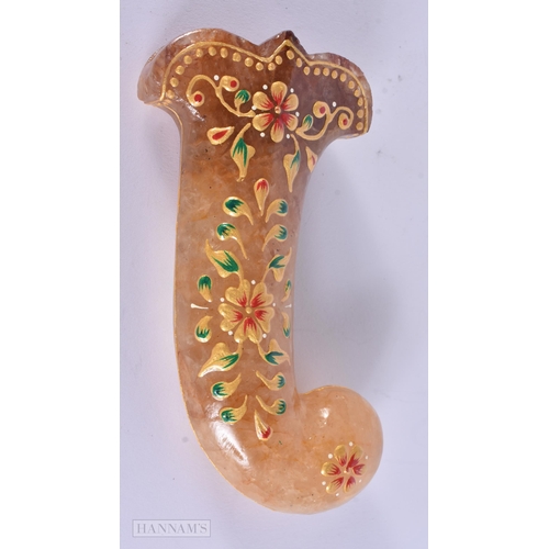 296 - A MIDDLE EASTERN ISLAMIC LACQUERED STONE DAGGER HANDLE. 18 cm long.