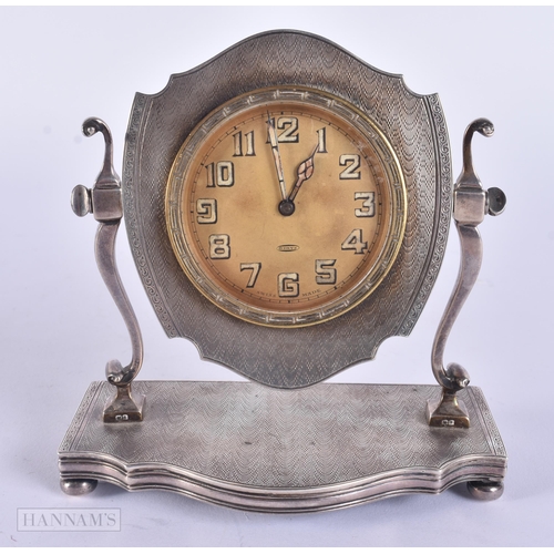 301 - AN ART DECO SILVER DESK CLOCK. 364 grams overall. 11.5 cm x 11 cm.
