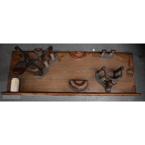 302 - A LARGE ANTIQUE IRISH CARVED EQUESTRIAN SADDLE RACK. 110 cm x 45 cm.