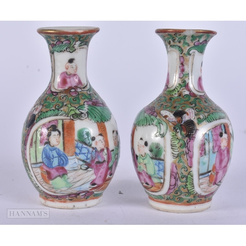 304 - A PAIR OF 19TH CENTURY CHINESE CANTON FAMILLE ROSE VASES Qing. 8 cm high.