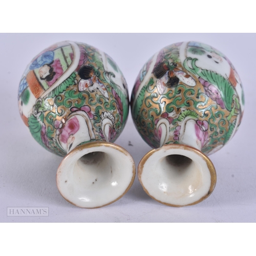 304 - A PAIR OF 19TH CENTURY CHINESE CANTON FAMILLE ROSE VASES Qing. 8 cm high.
