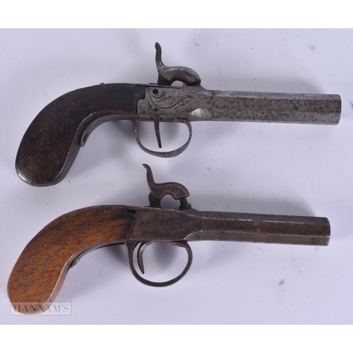 307 - TWO ANTIQUE PISTOLS. 17 cm wide. (2)
