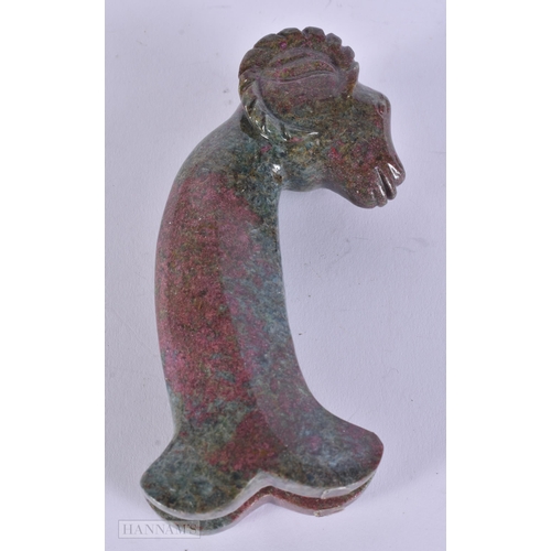 313 - A MIDDLE EASTERN CARVED STONE DAGGER. 472 grams. 14 cm x 8 cm.  WE ARE UNABLE TO SHIP THIS LOT IN-HO... 
