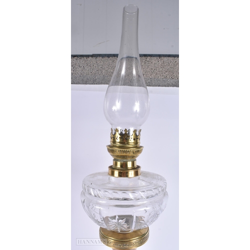 316 - AN ANTIQUE BRASS OIL LAMP. 52 cm high.