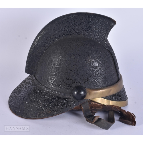 342 - AN ANTIQUE LEATHER FIREMANS HELMET bearing Scottish retailer to interior. 25 cm x 15 cm.