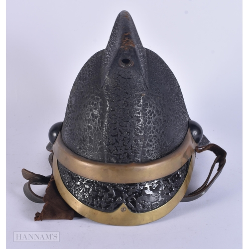 342 - AN ANTIQUE LEATHER FIREMANS HELMET bearing Scottish retailer to interior. 25 cm x 15 cm.