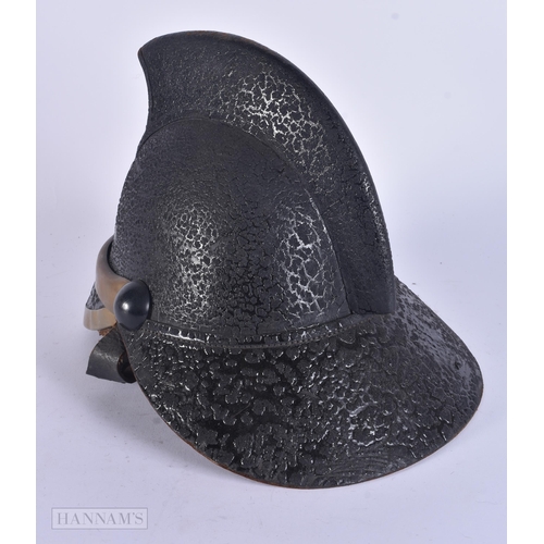 342 - AN ANTIQUE LEATHER FIREMANS HELMET bearing Scottish retailer to interior. 25 cm x 15 cm.