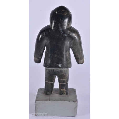 353 - AN EARLY 20TH CENTURY NORTH AMERICAN INUIT CARVED STONE FIGURE modelled as a hunter. 13 cm high.