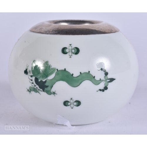 354 - A MEISSEN GERMAN PORCELAIN SILVER MOUNTED ASHTRAY. 7.5 cm wide.