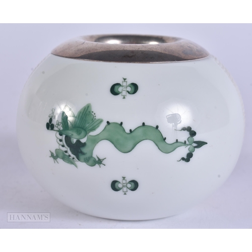 354 - A MEISSEN GERMAN PORCELAIN SILVER MOUNTED ASHTRAY. 7.5 cm wide.