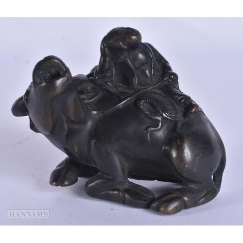 416 - AN 18TH/19TH CENTURY CHINESE BRONZE WATER DROPPER Qing, modelled as a figure upon a buffalo. 7.5 cm ... 