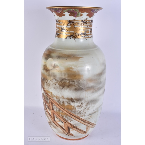 418 - A LARGE 19TH CENTURY JAPANESE MEIJI PERIOD PORCELAIN VASE finely painted with figures within a lands... 