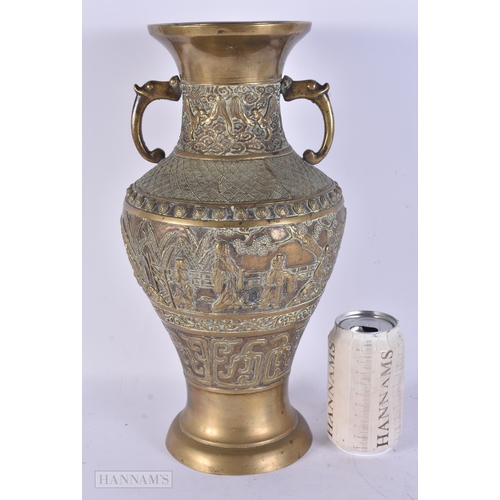 419 - A LARGE 19TH CENTURY CHINESE TWIN HANDLED BRONZE VASE Qing, decorated with figures in landscapes. 36... 