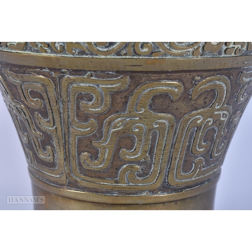 419 - A LARGE 19TH CENTURY CHINESE TWIN HANDLED BRONZE VASE Qing, decorated with figures in landscapes. 36... 