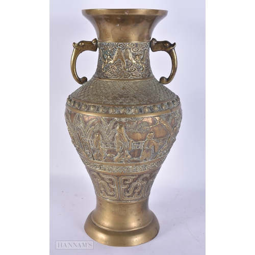 419 - A LARGE 19TH CENTURY CHINESE TWIN HANDLED BRONZE VASE Qing, decorated with figures in landscapes. 36... 