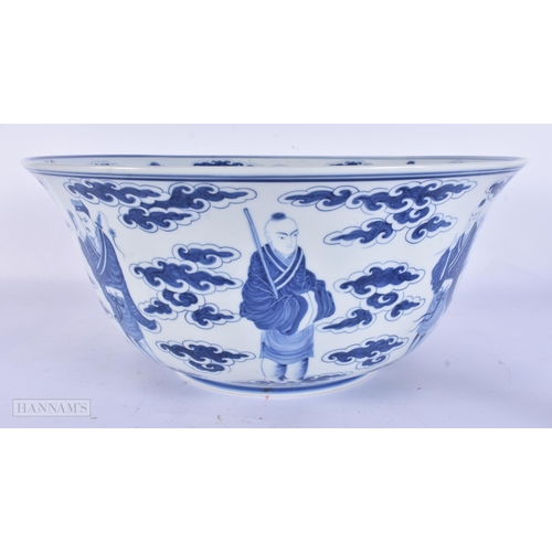 420 - A VERY LARGE EARLY 20TH CENTURY CHINESE BLUE AND WHITE PORCELAIN BOWL Late Qing, painted with immort... 