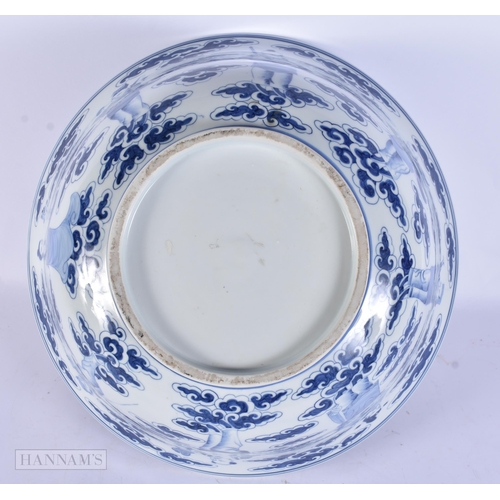 420 - A VERY LARGE EARLY 20TH CENTURY CHINESE BLUE AND WHITE PORCELAIN BOWL Late Qing, painted with immort... 