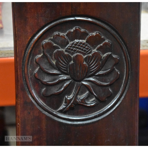 423 - A PAIR OF CHINESE QING DYNASTY CARVED HARDWOOD ARM CHAIRS. 90cm x 60cm.