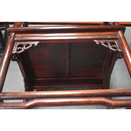 423 - A PAIR OF CHINESE QING DYNASTY CARVED HARDWOOD ARM CHAIRS. 90cm x 60cm.