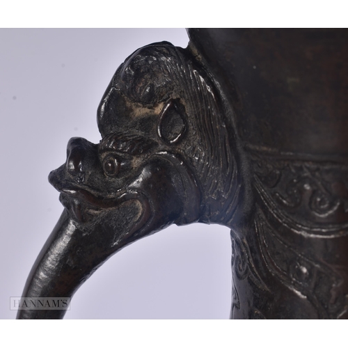 429 - A 17TH/18TH CENTURY CHINESE TWIN HANDLED BRONZE PRESENTATION VASE Ming/Qing. 30 cm x 12 cm.