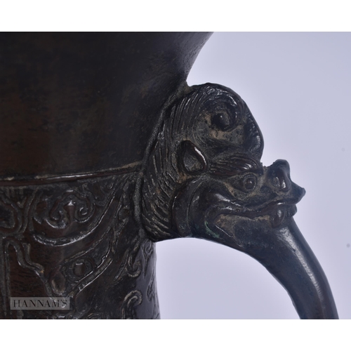429 - A 17TH/18TH CENTURY CHINESE TWIN HANDLED BRONZE PRESENTATION VASE Ming/Qing. 30 cm x 12 cm.