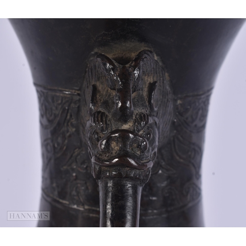 429 - A 17TH/18TH CENTURY CHINESE TWIN HANDLED BRONZE PRESENTATION VASE Ming/Qing. 30 cm x 12 cm.
