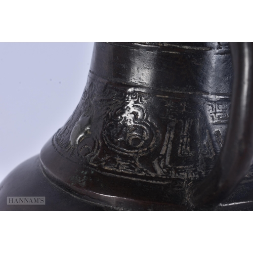 429 - A 17TH/18TH CENTURY CHINESE TWIN HANDLED BRONZE PRESENTATION VASE Ming/Qing. 30 cm x 12 cm.